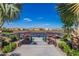 View of community tennis courts from a landscaped stairwell at 175 E Santa Lucia Ln, Queen Creek, AZ 85140