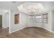 Open dining room features a gorgeous trey ceiling, and great natural lighting at 19333 N 68Th Ave, Glendale, AZ 85308