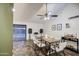 Dining room featuring neutral walls, modern light fixture, and seating for six at 2006 W Summit Pl, Chandler, AZ 85224