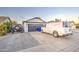 A house featuring a driveway alongside a garage and a vehicle at 2006 W Summit Pl, Chandler, AZ 85224