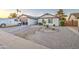 Charming single-story home featuring a xeriscaped front yard and white exterior at 2006 W Summit Pl, Chandler, AZ 85224