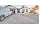 Charming single-story home featuring a xeriscaped front yard and white exterior at 2006 W Summit Pl, Chandler, AZ 85224