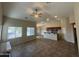 Open-concept living room with a vaulted ceiling, tile floors, and recessed lighting at 2010 E Indigo Dr, Chandler, AZ 85286