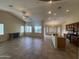 Bright and airy living room featuring tile floors, a fireplace, and an open layout at 2010 E Indigo Dr, Chandler, AZ 85286