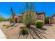 Beautiful front yard with desert landscaping and charming exterior details at 2011 W Calle De Las Estrella --, Phoenix, AZ 85085