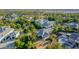 Expansive aerial view of a luxury community with green spaces and estate-style homes at 20406 E Sunset Ct, Queen Creek, AZ 85142