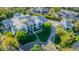 Wide aerial view of a large house on a large manicured lot in a neighborhood at 20406 E Sunset Ct, Queen Creek, AZ 85142