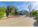 Private basketball court adjacent to the home, offering an active outdoor space at 20406 E Sunset Ct, Queen Creek, AZ 85142