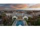 Overhead view of a sprawling backyard featuring a stunning pool and an entertainment area with mountain views at 20406 E Sunset Ct, Queen Creek, AZ 85142