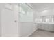 Well-lit bathroom with sleek walk-in shower, gray cabinets, and double sinks at 20660 N Confetti Ct, Maricopa, AZ 85138