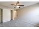 Bedroom with a closet and a view of the hallway at 22139 N Van Loo Dr, Maricopa, AZ 85138