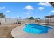 Backyard featuring an in-ground swimming pool with concrete patio at 2215 N 58Th Dr, Phoenix, AZ 85035