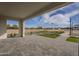 Covered patio area features a paved stone patio with a view of the community at 2779 E Derringer Way, Gilbert, AZ 85295