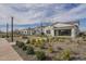 Modern home's backyard features a fire pit and beautiful landscaping at 2779 E Derringer Way, Gilbert, AZ 85295