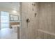 A bright bathroom featuring a vanity, freestanding tub and tiled shower at 2779 E Derringer Way, Gilbert, AZ 85295