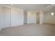 Spacious bedroom features neutral carpet, white walls, and a walk-in closet at 2779 E Derringer Way, Gilbert, AZ 85295