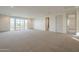 A bonus room featuring carpet, neutral walls, french doors, and doorways to other rooms at 2779 E Derringer Way, Gilbert, AZ 85295