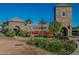 Stone community sign reading 'Somerset' with flowerbeds, landscaping, and blue sky backdrop at 2779 E Derringer Way, Gilbert, AZ 85295