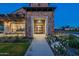 Beautiful stone exterior and welcoming entrance to this community clubhouse with manicured landscaping at 2779 E Derringer Way, Gilbert, AZ 85295