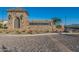 Stone community entrance with brick paved path, landscaping and Atrium at Somerset signage at 2779 E Derringer Way, Gilbert, AZ 85295