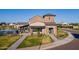 Beautiful exterior view of a stone clubhouse with well-maintained landscaping at 2779 E Derringer Way, Gilbert, AZ 85295