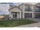 Attractive two-story home with brick accents, a two-car garage, and well-manicured front yard at 2779 E Derringer Way, Gilbert, AZ 85295