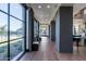 Elegant hallway featuring large windows, stylish decor, and contemporary finishes at 2779 E Derringer Way, Gilbert, AZ 85295