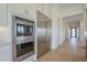 Modern kitchen with stainless steel fridge and built in oven at 2779 E Derringer Way, Gilbert, AZ 85295