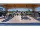 Relaxing community pool pavilion featuring comfortable seating and shade, perfect for outdoor gatherings at 2779 E Derringer Way, Gilbert, AZ 85295