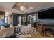 Inviting living room featuring an area rug and abundant natural light at 303 W Hazelwood St, Phoenix, AZ 85013