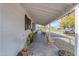 Inviting porch with rocking chairs and decorative plants at 303 W Hazelwood St, Phoenix, AZ 85013