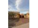 Home featuring a desert-landscaped backyard at 304 E Madison St, Avondale, AZ 85323