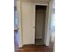 A partially opened sliding closet door reveals ample closet space at 304 E Madison St, Avondale, AZ 85323