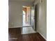 Freshly painted entryway with tile and laminate flooring and neutral walls at 304 E Madison St, Avondale, AZ 85323