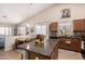 Spacious kitchen featuring a large island with granite countertops, and stainless steel appliances at 320 W Phantom Dr, Casa Grande, AZ 85122