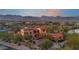 Exterior showcasing the property's architecture with a stunning mountain backdrop at 3756 N Rock Wren Ct, Buckeye, AZ 85396