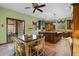 Spacious kitchen with a breakfast table and chairs, wooden cabinets, and ample countertop space at 3756 N Rock Wren Ct, Buckeye, AZ 85396