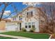 Traditional two-story home, with a manicured lawn and an attached two-car garage at 3760 E Cotton Ct, Gilbert, AZ 85234