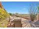 Landscaped backyard with desert plants, patio and scenic views at 41225 N River Bend Rd, Phoenix, AZ 85086