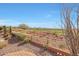 Stunning backyard view overlooking the golf course, desert landscape, and distant mountains at 41225 N River Bend Rd, Phoenix, AZ 85086