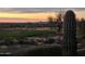 View from backyard showing the beautiful desert landscape, golf course and mountains in the far background at 41225 N River Bend Rd, Phoenix, AZ 85086