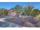 Charming single-story home with desert landscaping, rock ground cover, a two-car garage and tile roof at 41225 N River Bend Rd, Phoenix, AZ 85086