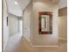 Hallway features neutral decor and leads to various rooms, providing a smooth transition throughout the house at 41225 N River Bend Rd, Phoenix, AZ 85086