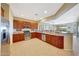 Well-lit kitchen with granite counters, stainless steel appliances, and an open layout at 41225 N River Bend Rd, Phoenix, AZ 85086