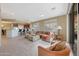 Spacious living area showcases abundant natural light and an open flow to the kitchen area at 41225 N River Bend Rd, Phoenix, AZ 85086