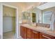 Bathroom featuring a double sink vanity with a mirror and lighting at 41225 N River Bend Rd, Phoenix, AZ 85086