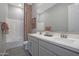 Practical bathroom featuring a double sink vanity, neutral walls, and a shower/tub combination for convenience at 44323 N 43Rd Dr, Phoenix, AZ 85087