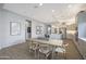 Inviting dining area connected to a modern kitchen with stainless steel appliances and island seating at 44323 N 43Rd Dr, Phoenix, AZ 85087