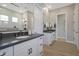 Elegant bathroom with double sinks, stylish tile, and modern fixtures at 44409 N 43Rd Dr, Phoenix, AZ 85087