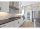 Well-lit kitchen featuring modern appliances, ample counter space, and stylish finishes at 44409 N 43Rd Dr, Phoenix, AZ 85087